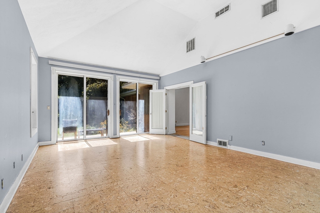 66 Taylor Road Stow, MA 01775 - Photo 16 of 42 a view of an empty room with window