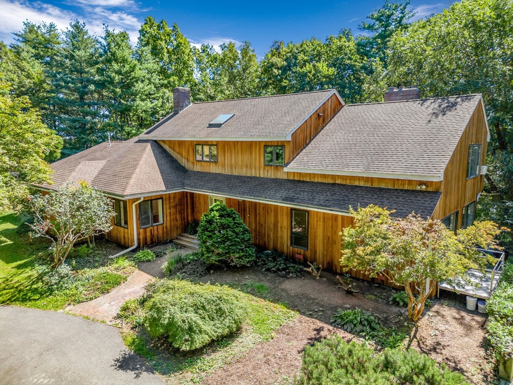 66 Taylor Road Stow, MA 01775 - Photo 2 of 42 an aerial view of a house