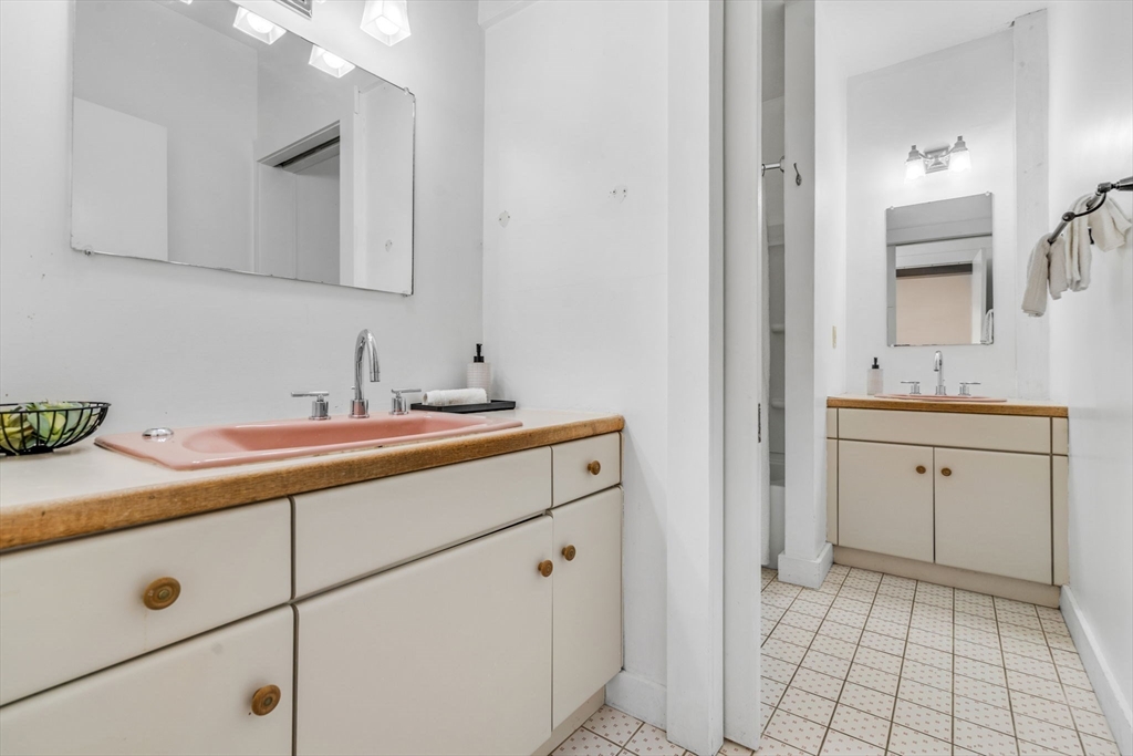 66 Taylor Road Stow, MA 01775 - Photo 21 of 42 a bathroom with a sink vanity and mirror