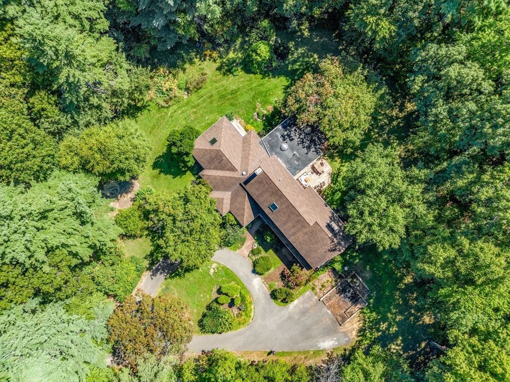 66 Taylor Road Stow, MA 01775 - Photo 30 of 42 an aerial view of a house with yard swimming pool and outdoor seating