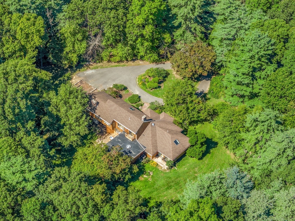 66 Taylor Road Stow, MA 01775 - Photo 31 of 42 an aerial view of a house with a yard and lake view