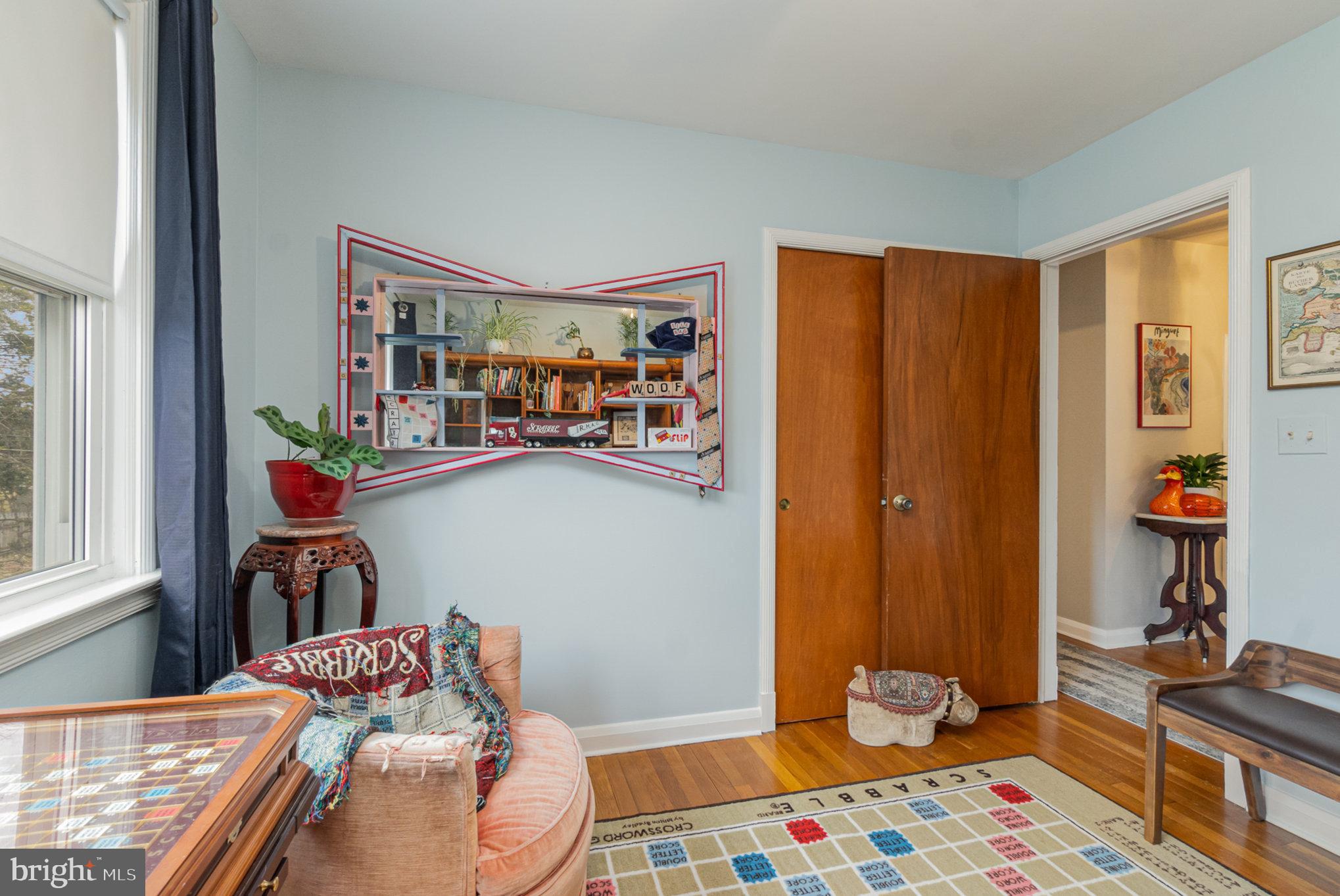 1406 Shefford Road Baltimore, MD 21239 - Photo 17 of 33 a bedroom with baby crib and a window