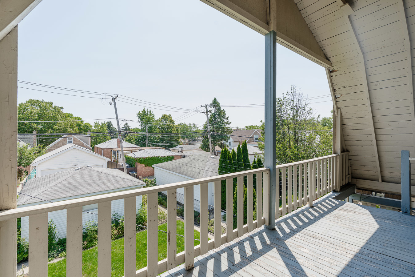 5219 North Rutherford Avenue, Unit 2 Chicago, IL 60656 - Photo 9 of 10 a view of a balcony with wooden floor