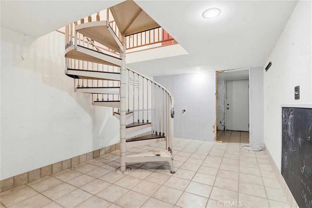 7264 Hillrose Street Tujunga, CA 91042 - Photo 18 of 27 a view of entryway and hall with wooden floor