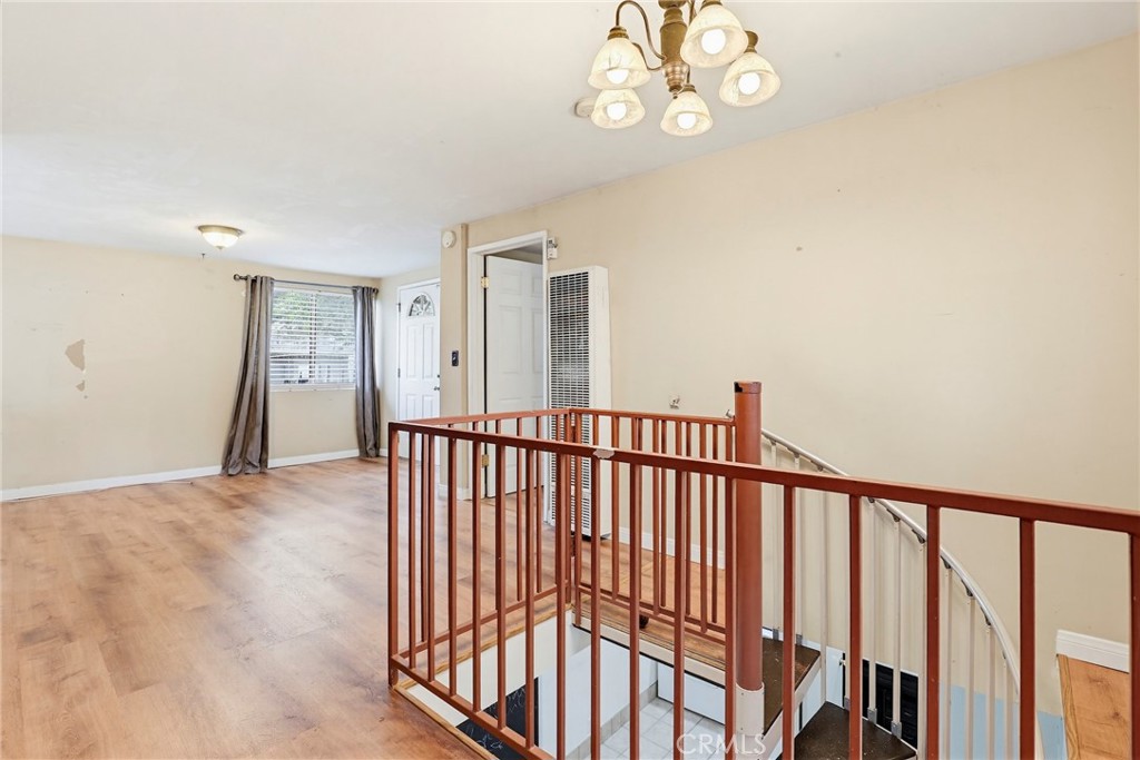 7264 Hillrose Street Tujunga, CA 91042 - Photo 9 of 27 a view of a hallway with staircase