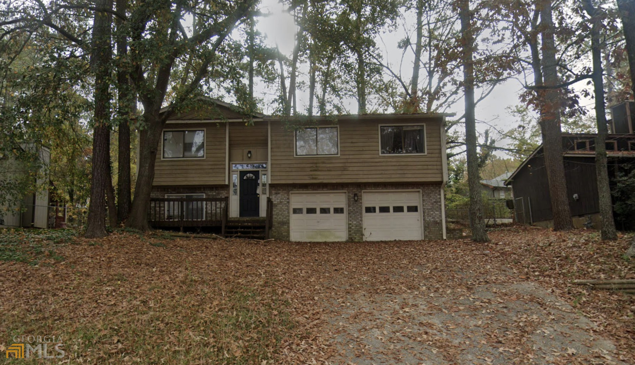 6824 Red Maple Drive Rex, GA 30273 - Photo 1 of 1 a front view of a house with a yard