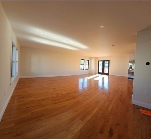 31 Niagara Street Fall River, MA 02721 - Photo 10 of 12 a view of room with window and wooden floor