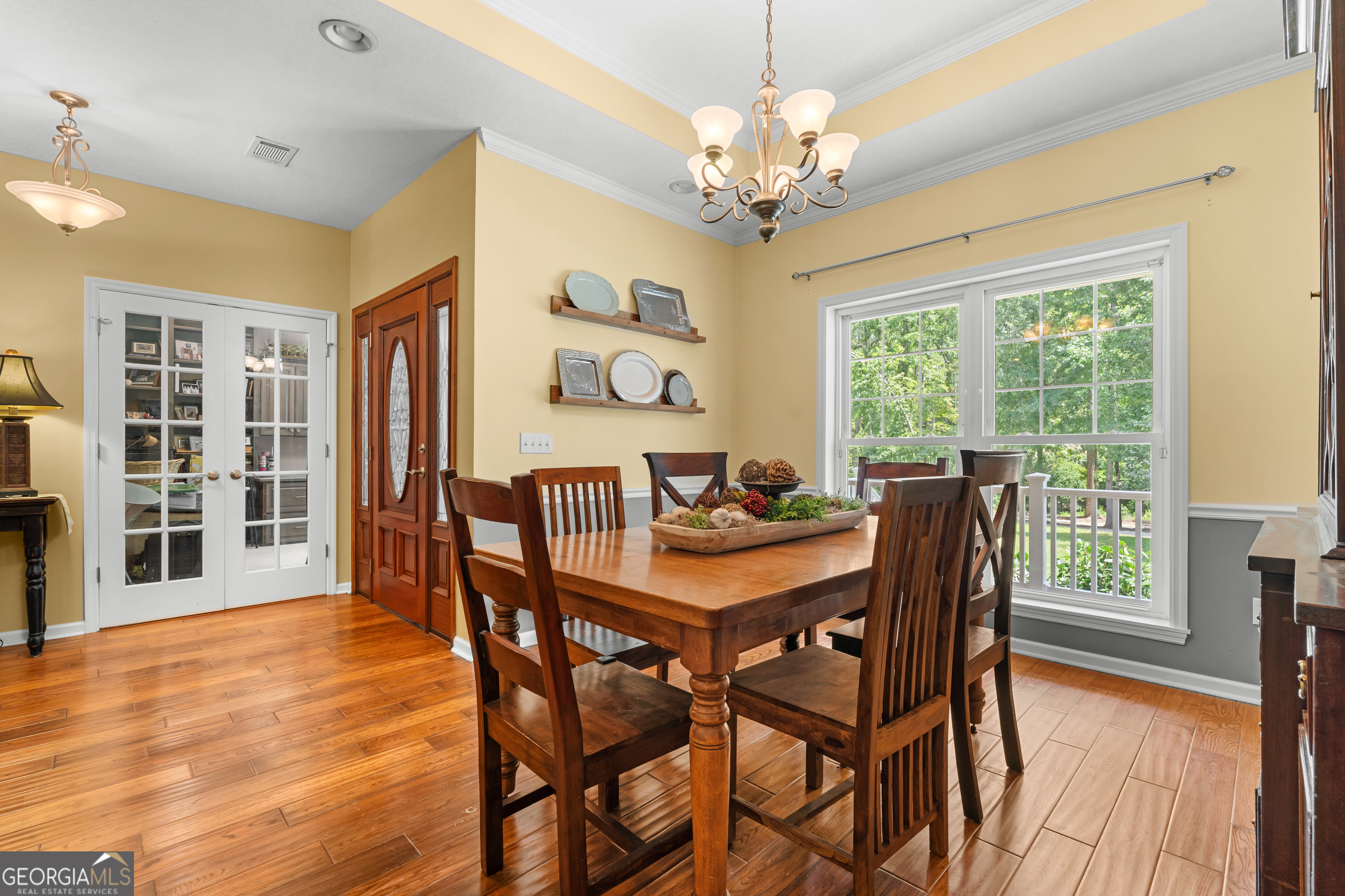 480 Best Bridge Road Sylvania, GA 30467 - Photo 22 of 57 a view of a dining room with furniture window and outside view