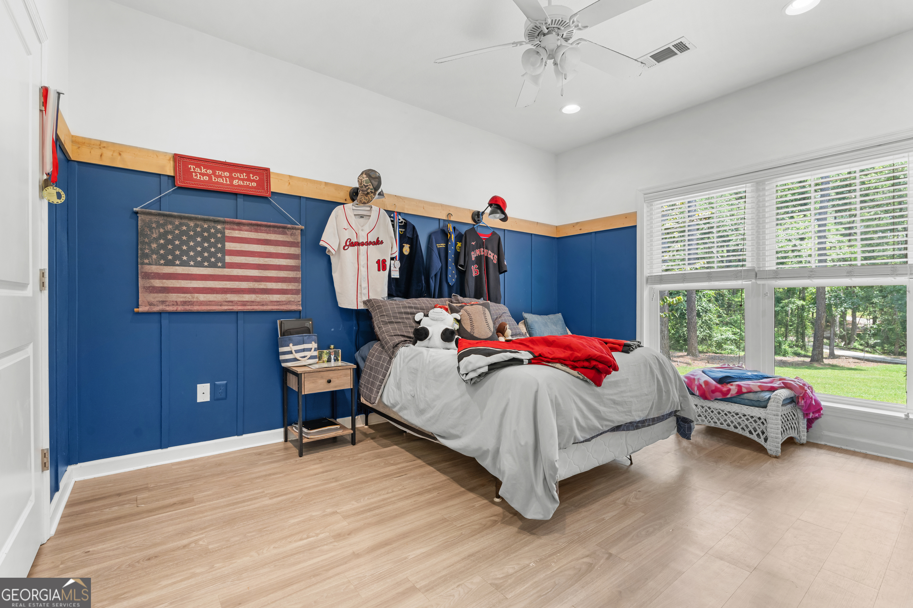 480 Best Bridge Road Sylvania, GA 30467 - Photo 29 of 57 a bedroom with a bed and a large window