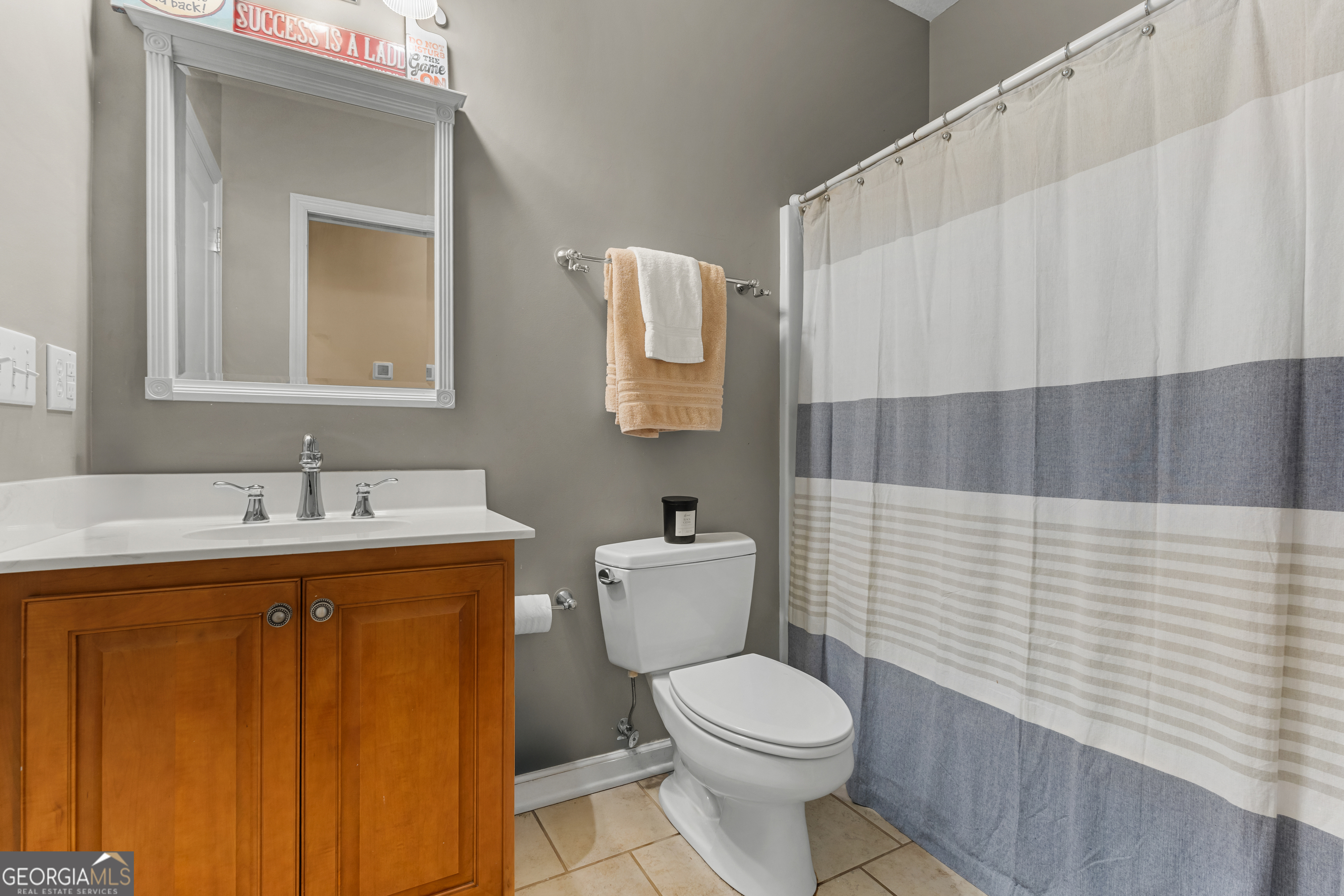 480 Best Bridge Road Sylvania, GA 30467 - Photo 31 of 57 a bathroom with a sink a toilet and mirror