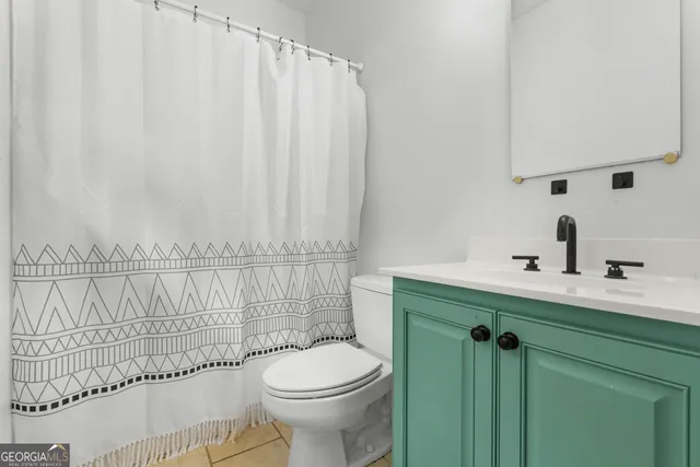 a bathroom with a sink and a toilet