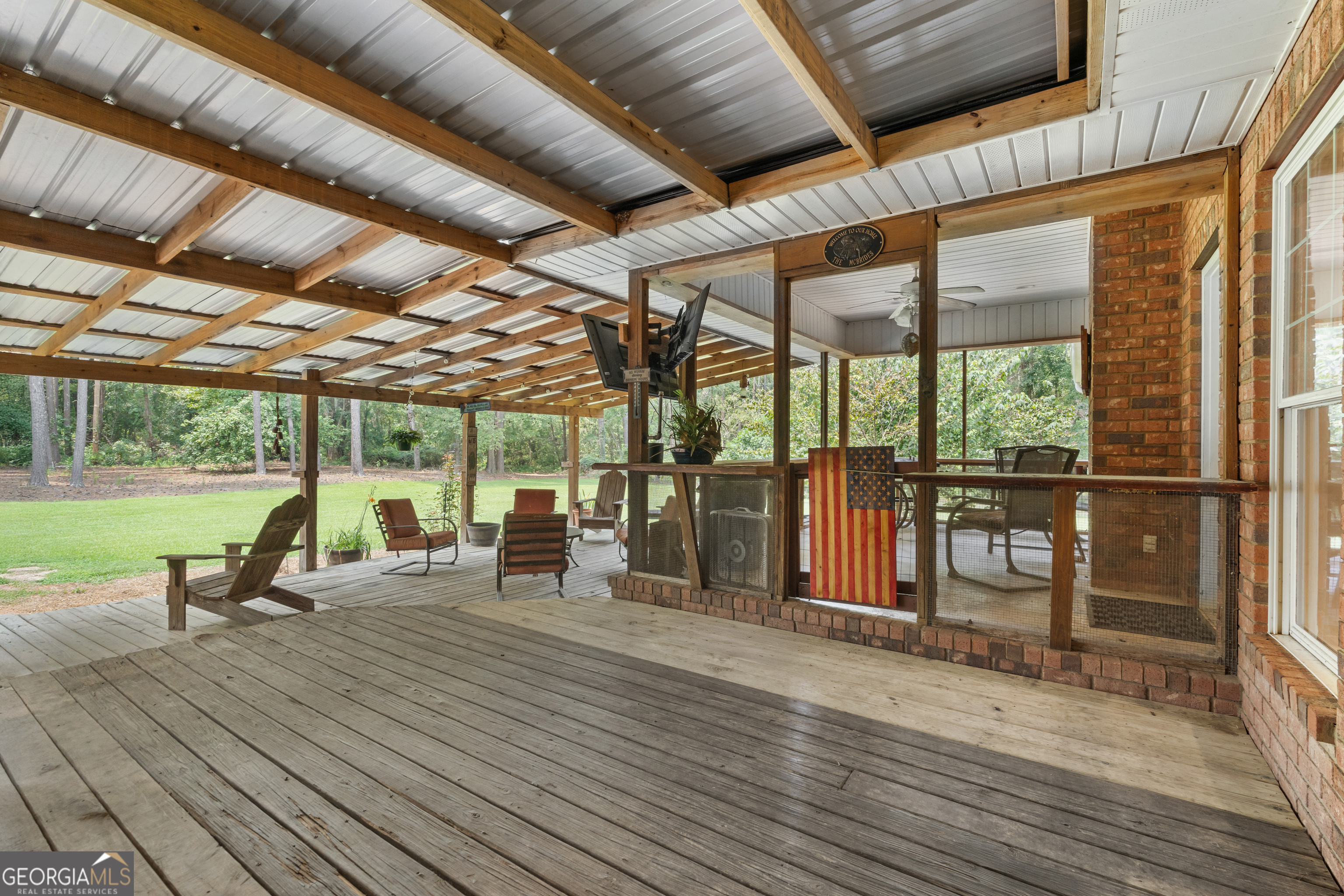 480 Best Bridge Road Sylvania, GA 30467 - Photo 41 of 57 a view of a patio with wooden floor