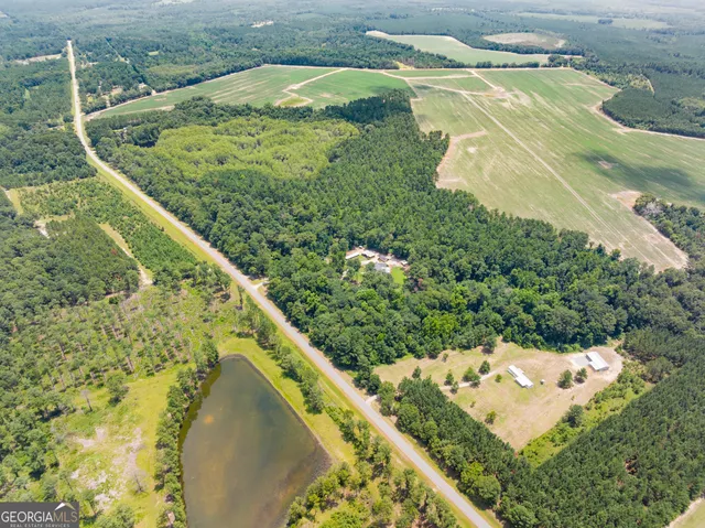 a view of a lake with a yard