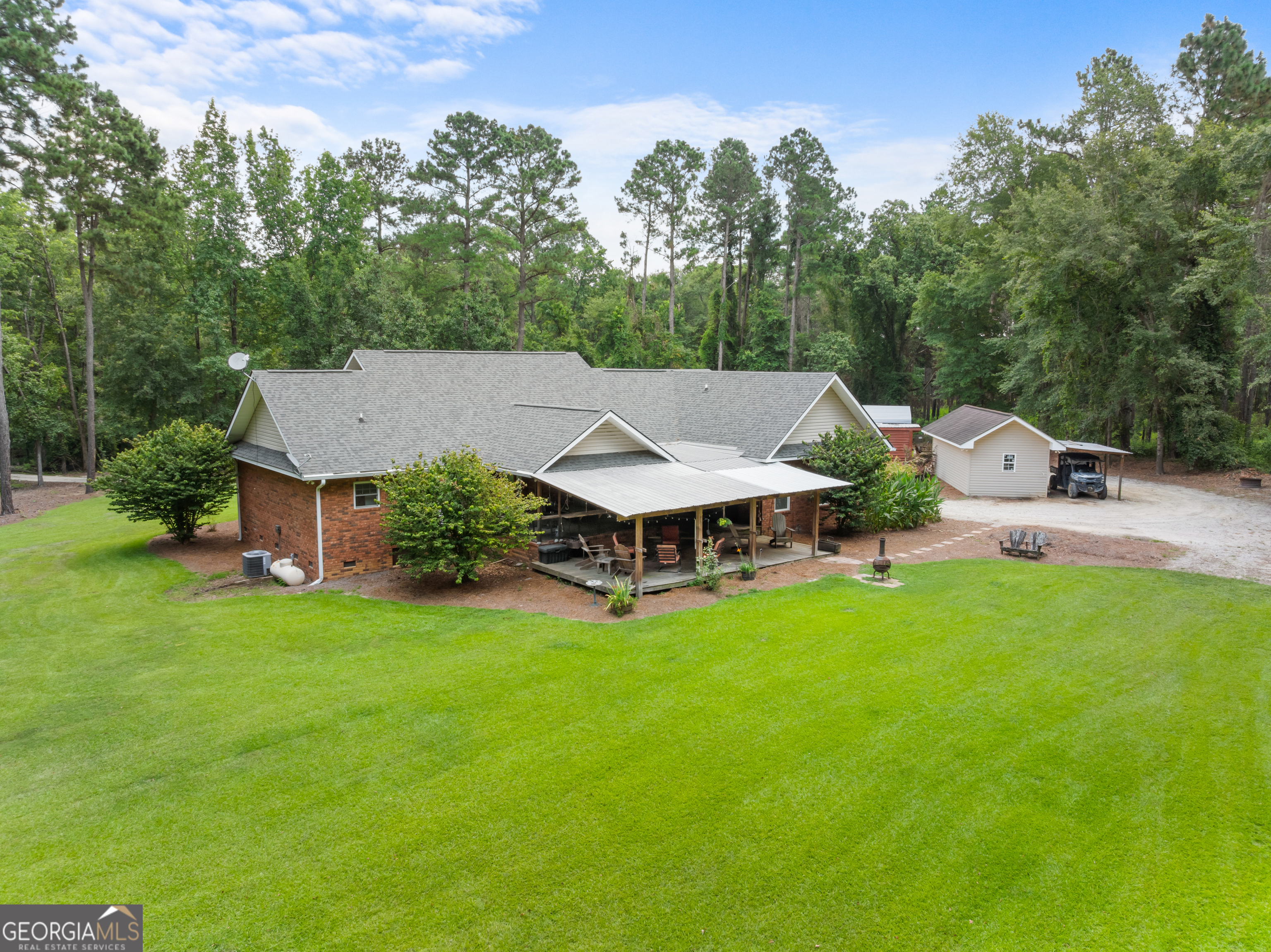 480 Best Bridge Road Sylvania, GA 30467 - Photo 5 of 57 an aerial view of a house with backyard garden and trees