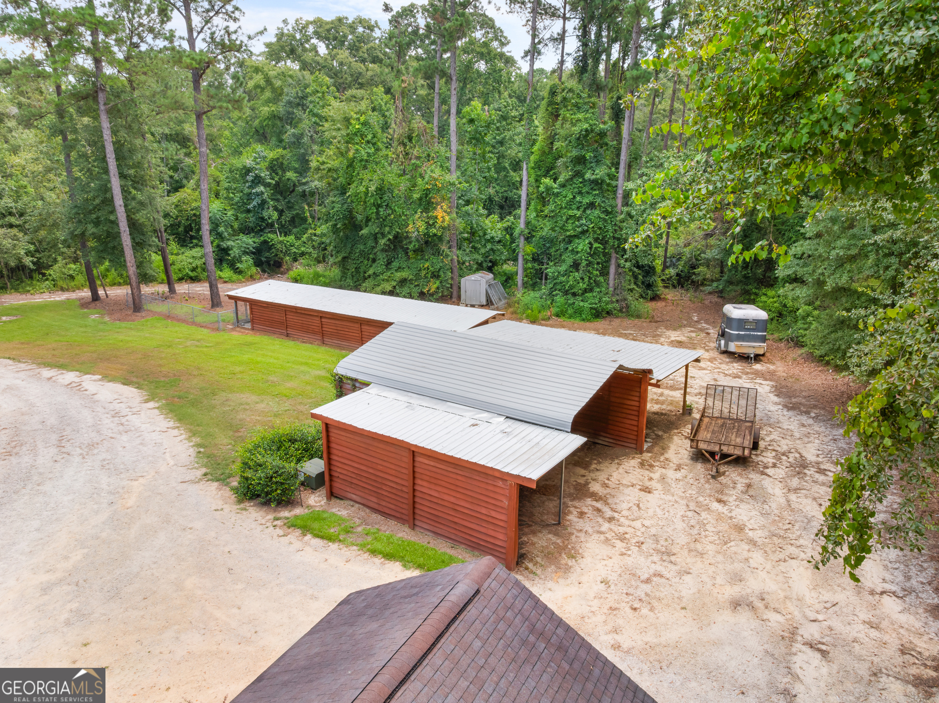 480 Best Bridge Road Sylvania, GA 30467 - Photo 52 of 57 an aerial view of a house with garden space and trees all around