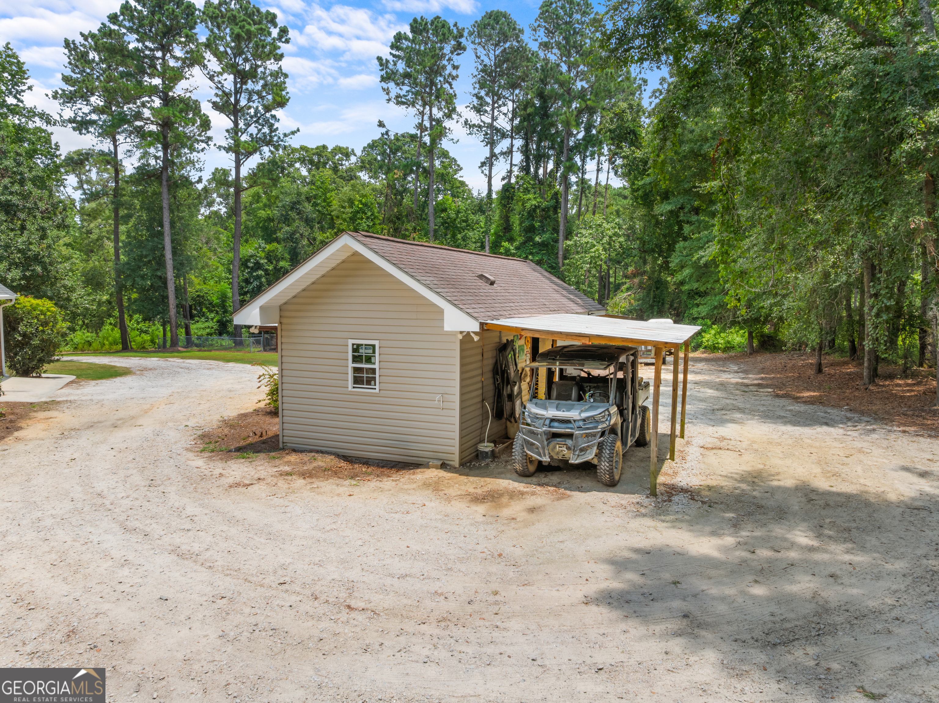 480 Best Bridge Road Sylvania, GA 30467 - Photo 54 of 57 a view of a house with a yard and sitting area