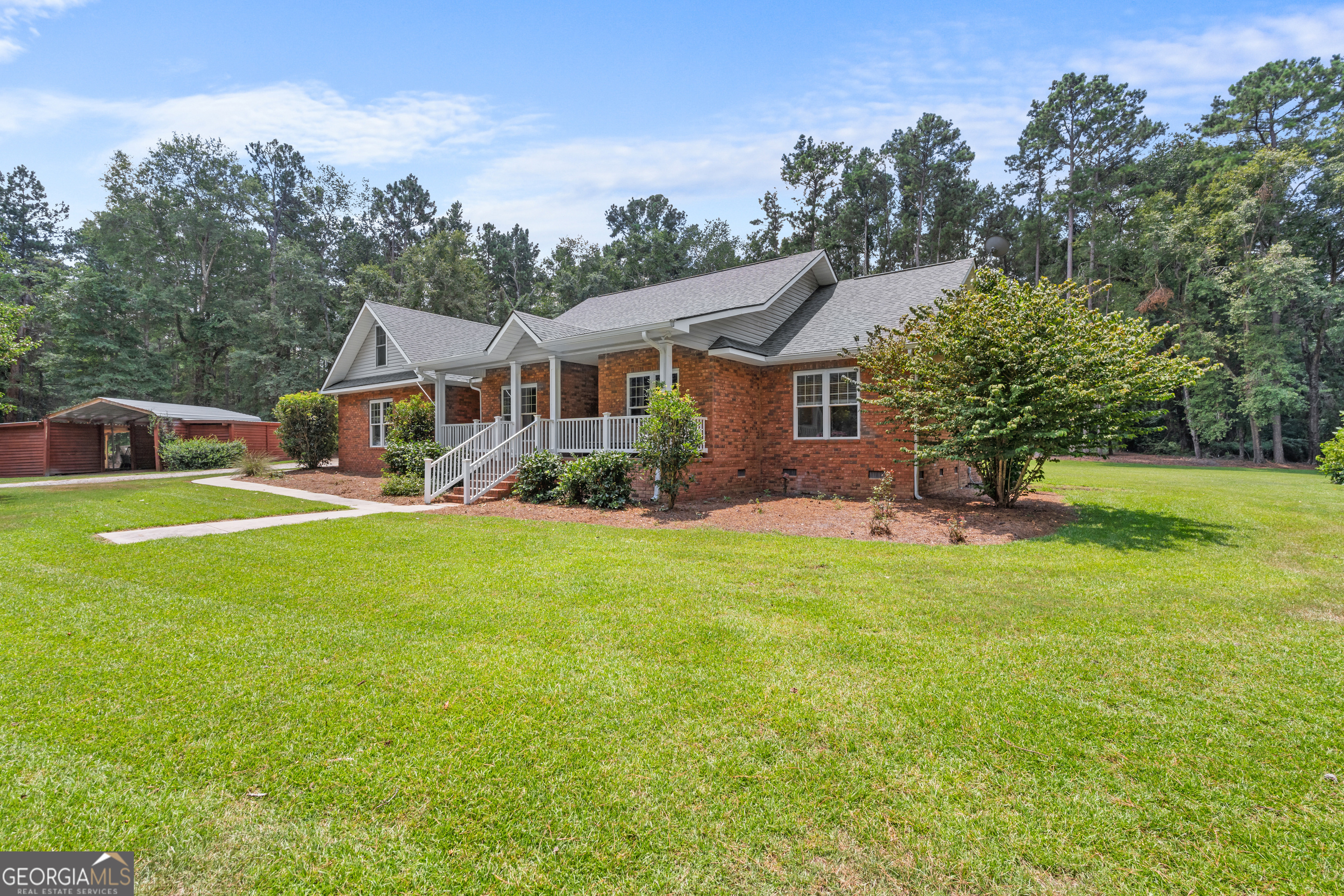 480 Best Bridge Road Sylvania, GA 30467 - Photo 7 of 57 front view of a house with a big yard