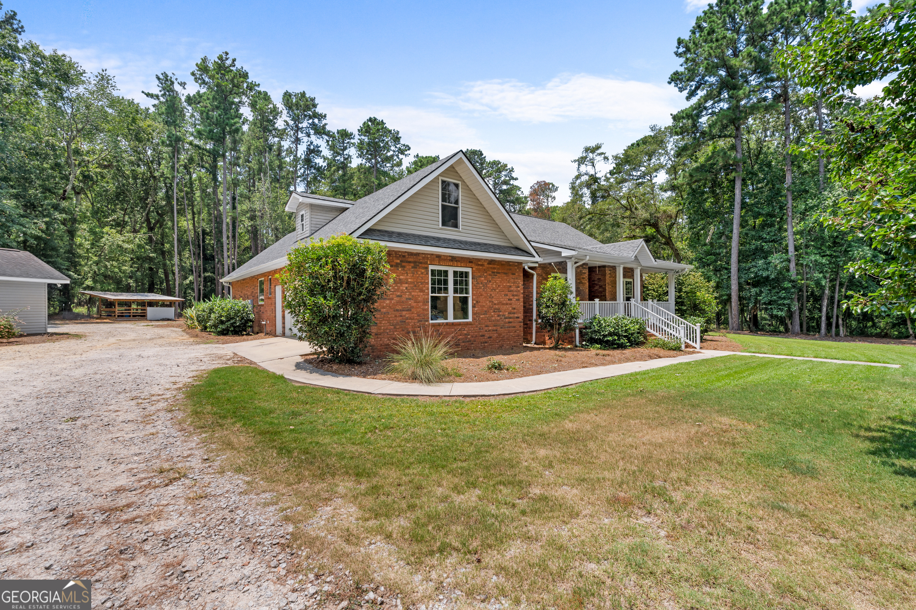 480 Best Bridge Road Sylvania, GA 30467 - Photo 8 of 57 a front view of a house with garden
