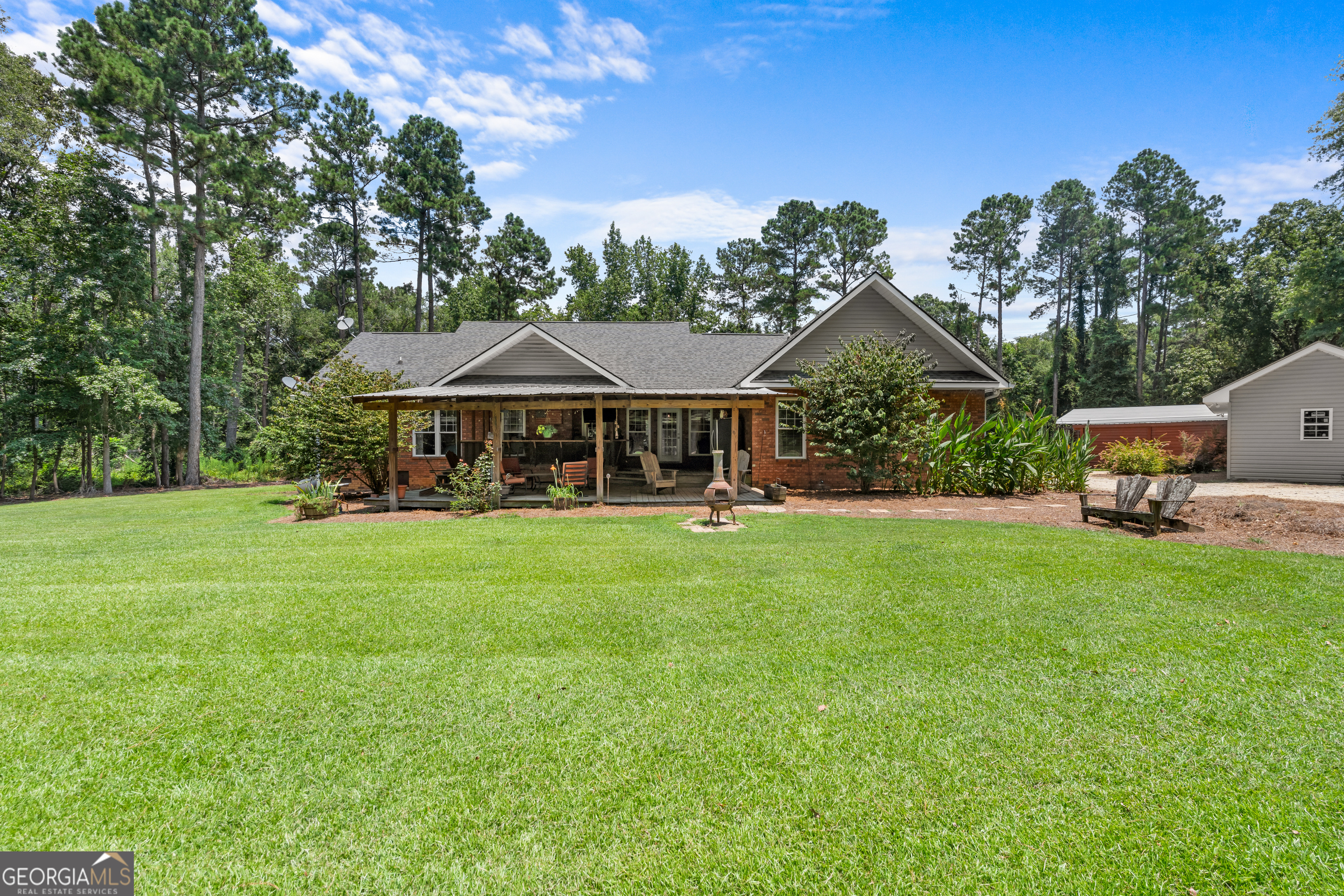 480 Best Bridge Road Sylvania, GA 30467 - Photo 9 of 57 a front view of a house with a garden