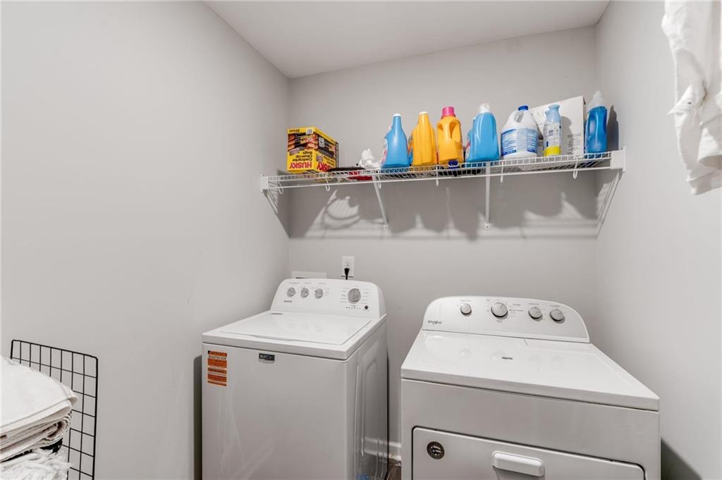 227 Waters Edge Parkway Temple, GA 30179 - Photo 13 of 26 a utility room with dryer and washer