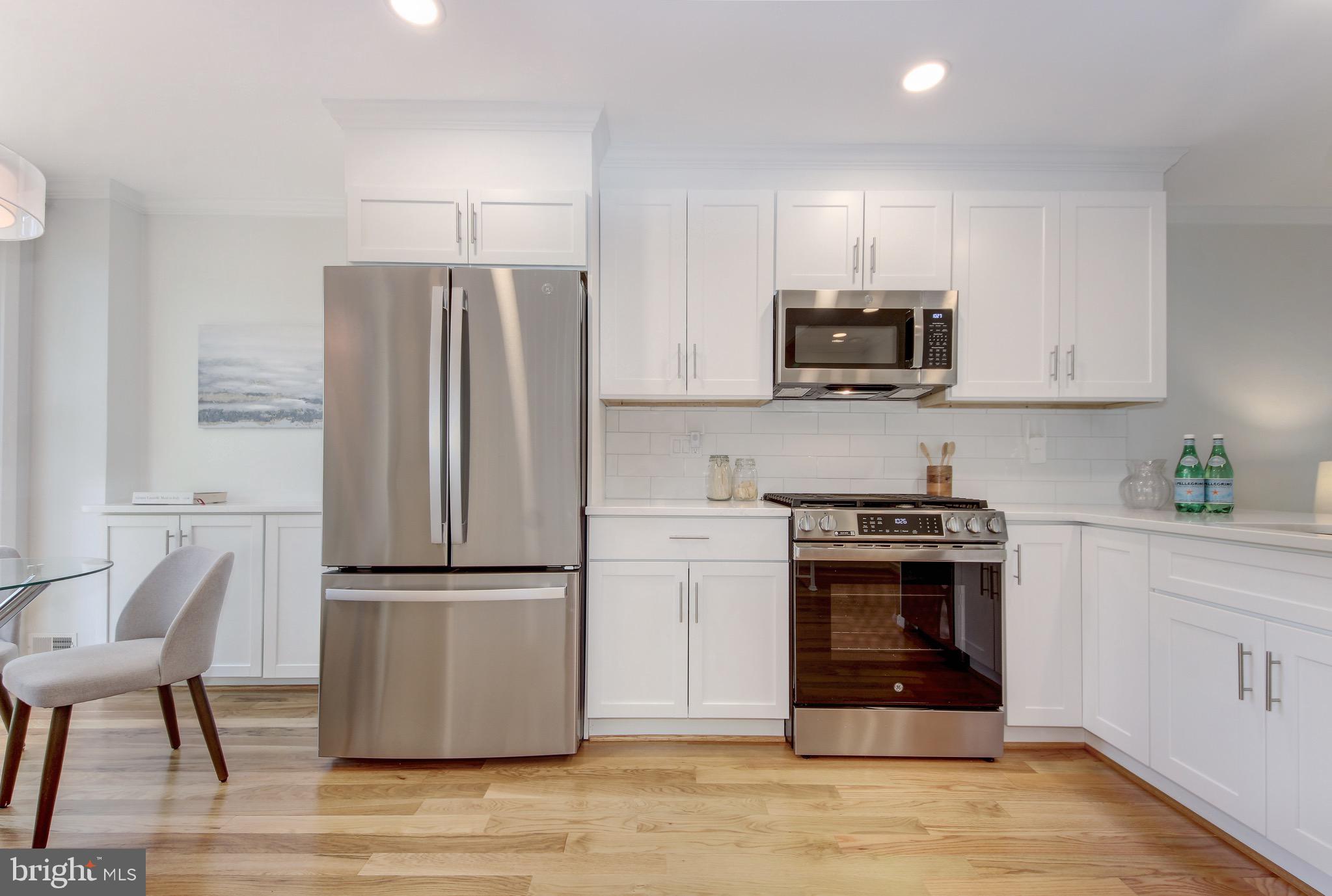 729 3rd Street Southwest Washington, DC 20024 - Photo 3 of 33 Quartz countertops and stainless steel appliances