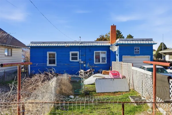 a view of table and chairs in patio