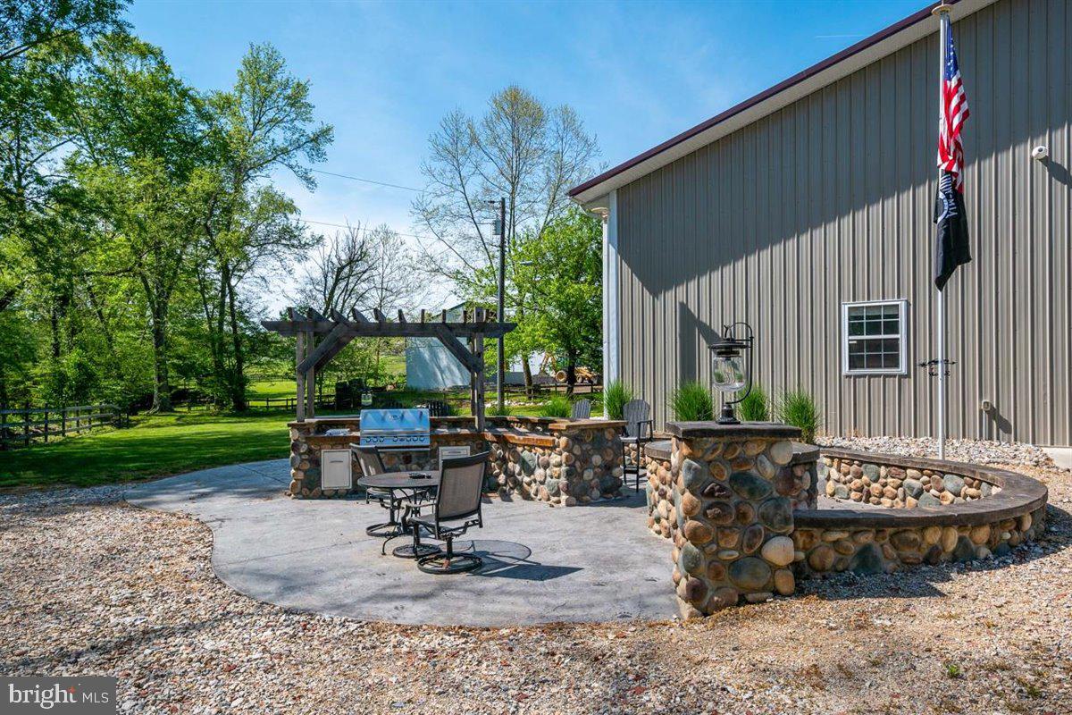 1590 Governor Bridge Road Davidsonville, MD 21035 - Photo 50 of 65 Awesome built-in BBQ w/ seating, lights, hardscape