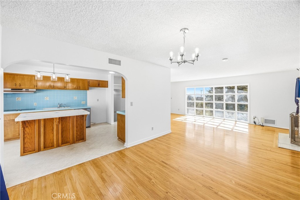 8705 Apple Tree Lane Cherry Valley, CA 92223 - Photo 15 of 72 Dining room open to kitchen