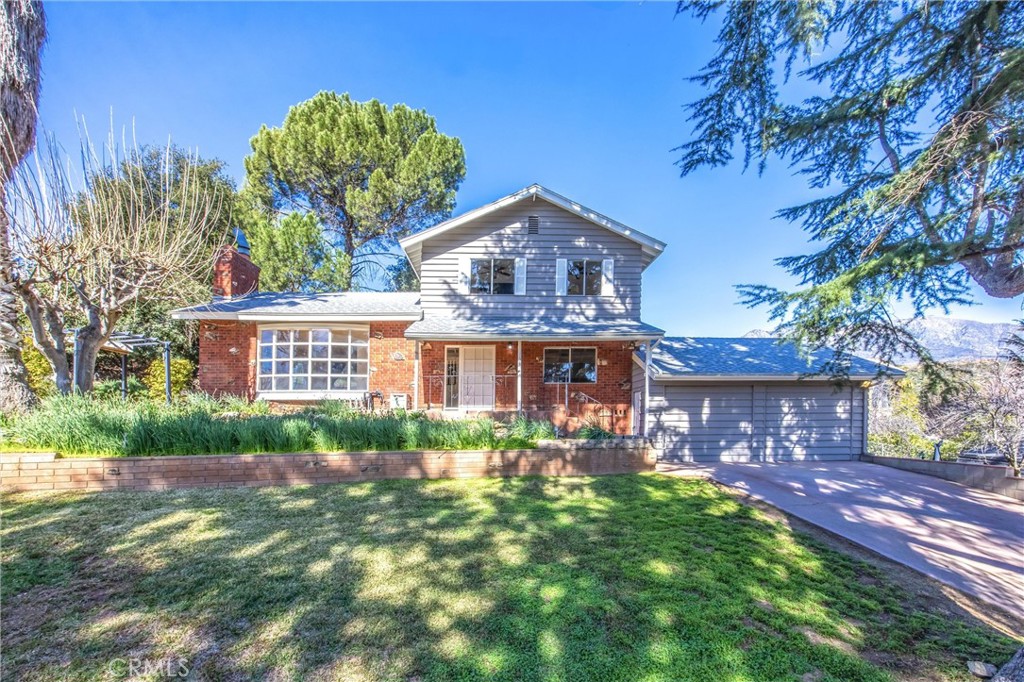 8705 Apple Tree Lane Cherry Valley, CA 92223 - Photo 2 of 72 Covered front porch. Currently flowers not in bloom.