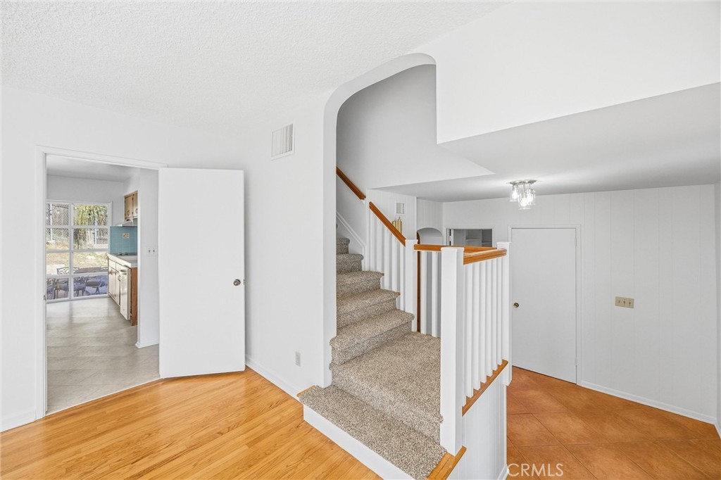 8705 Apple Tree Lane Cherry Valley, CA 92223 - Photo 28 of 72 living room access to stairs