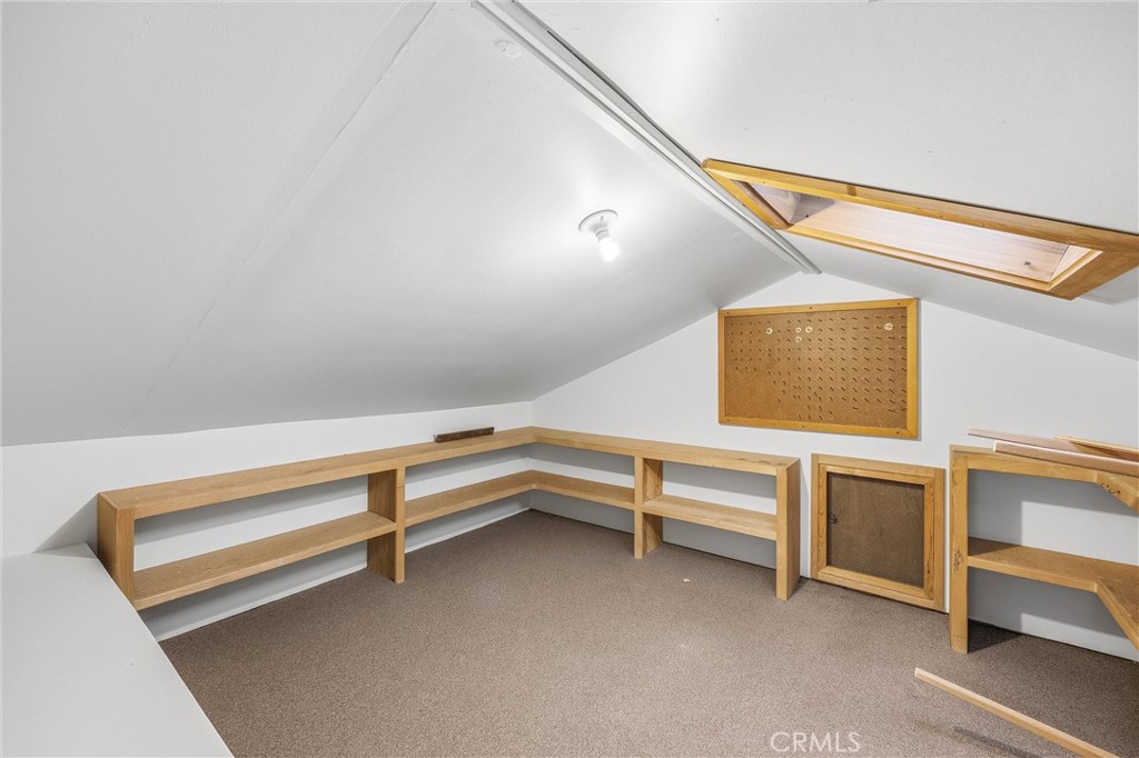 8705 Apple Tree Lane Cherry Valley, CA 92223 - Photo 38 of 72 Attic storage room entrance at top of stairs on second floor