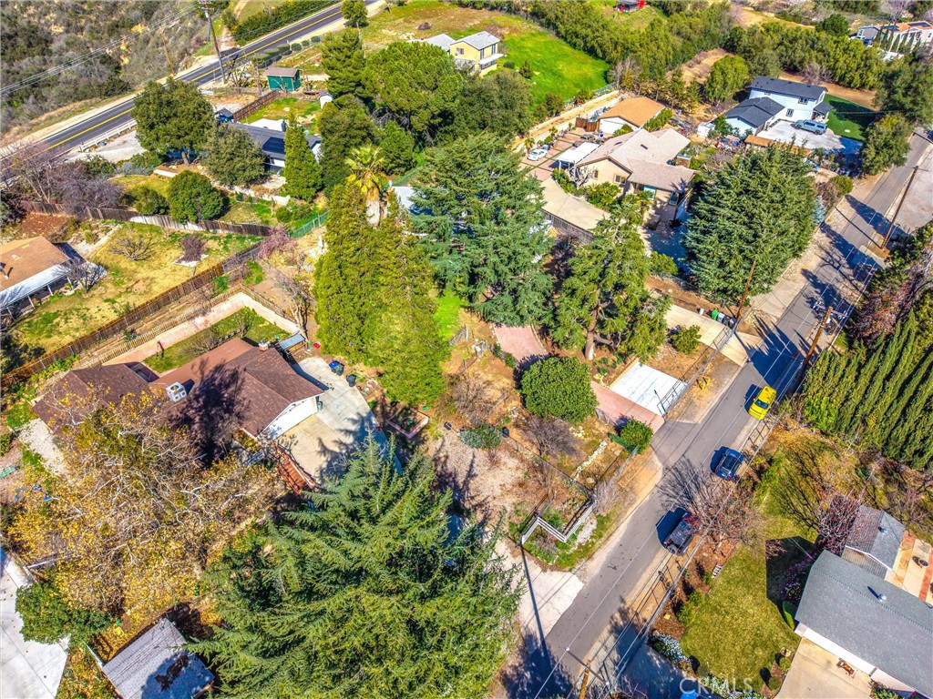 8705 Apple Tree Lane Cherry Valley, CA 92223 - Photo 68 of 72 Parking and RV parking behind gates. Road paved.