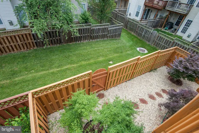 a view of balcony with yard