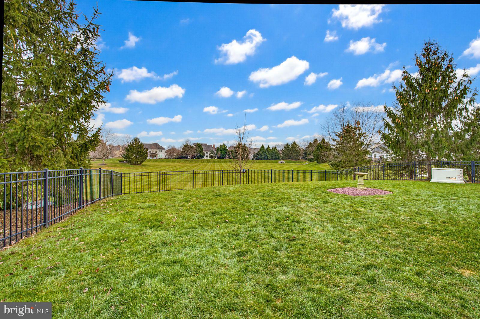 628 Dorset Street Lititz, PA 17543 - Photo 11 of 45 a view of a golf course with a lake