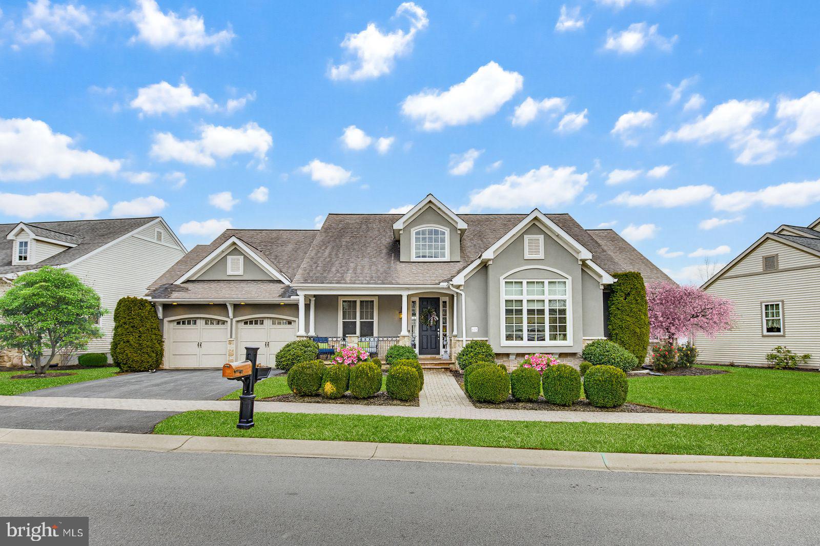 628 Dorset Street Lititz, PA 17543 - Photo 2 of 45 a view of a big house with a big yard and large trees