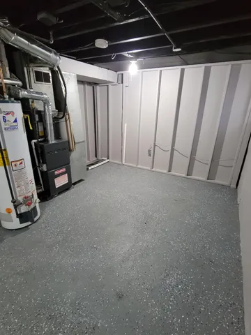 a view of an empty room with stairs