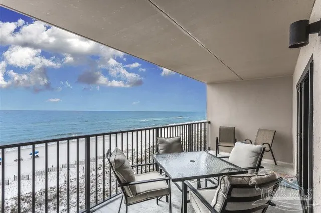 a kitchen with a stove top oven and cabinets