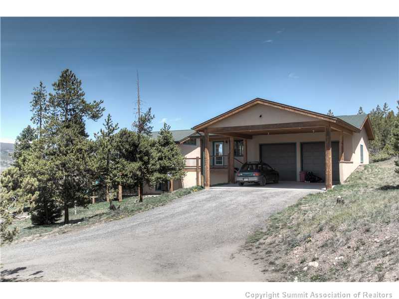 48 H Road Silverthorne, CO 80498 - Photo 17 of 18 Parking Lot/Garage. Detached garage with carport