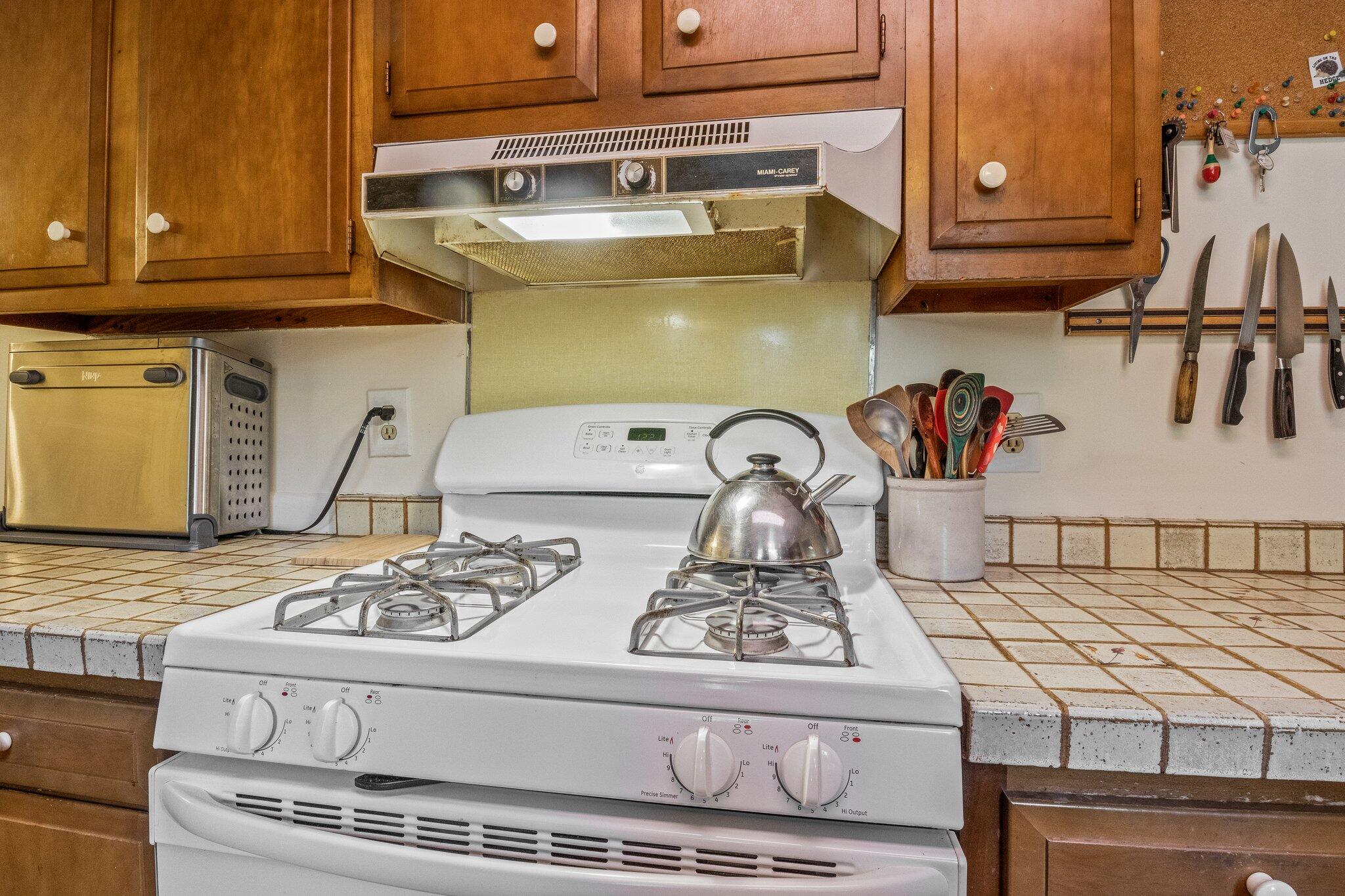 80 Prell Circle Brewster, MA 02631 - Photo 15 of 34 a kitchen with a stove and cabinets