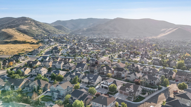 14738 Tangle Hill Road Herriman, UT 84096 - Photo 7 of 66 Sprawling residential development with varied architectural styles situated against a mountainous backdrop