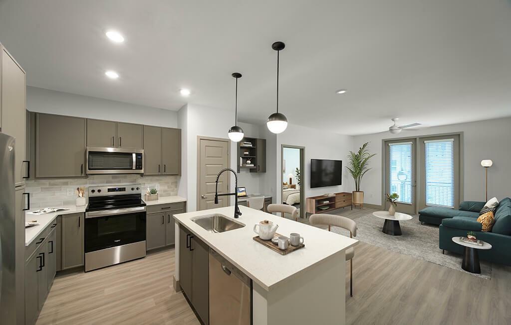 7260 Roswell Road, Unit B2 Sandy Springs, GA 30328 - Photo 16 of 23 a kitchen with stainless steel appliances kitchen island granite countertop a sink a stove and a wooden floors