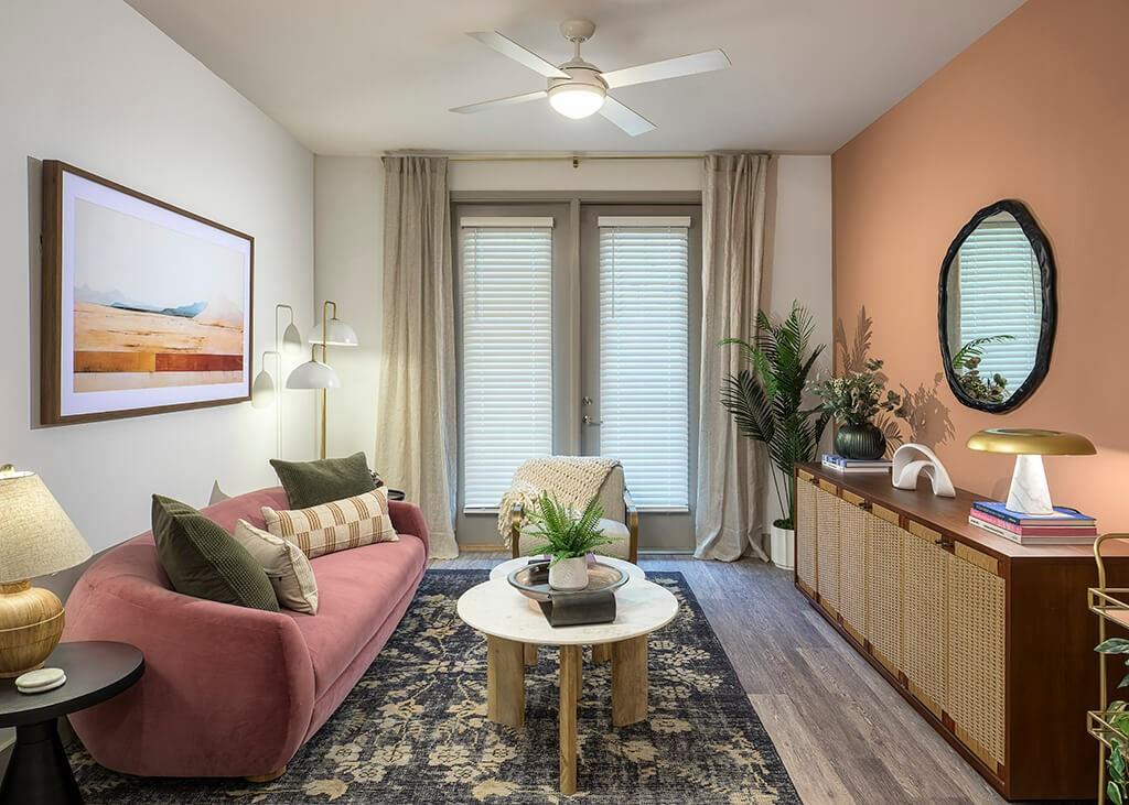 7260 Roswell Road, Unit B2 Sandy Springs, GA 30328 - Photo 20 of 23 a living room with furniture a window and a potted plant