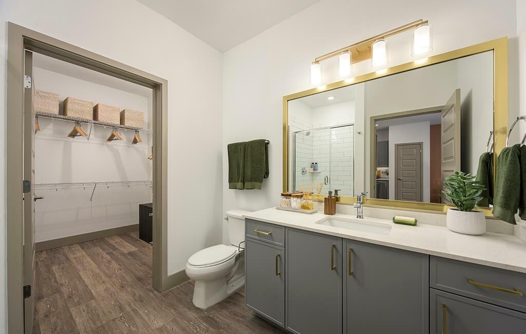 7260 Roswell Road, Unit B2 Sandy Springs, GA 30328 - Photo 10 of 23 a bathroom with a double vanity sink toilet and shower