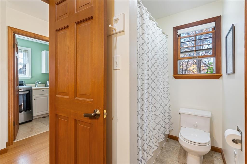 158 Becker Road Butler, PA 16002 - Photo 16 of 32 a bathroom with a toilet and a shower