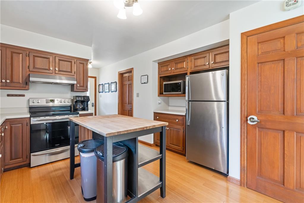 158 Becker Road Butler, PA 16002 - Photo 6 of 32 a kitchen with stainless steel appliances granite countertop a refrigerator a stove a sink and a refrigerator