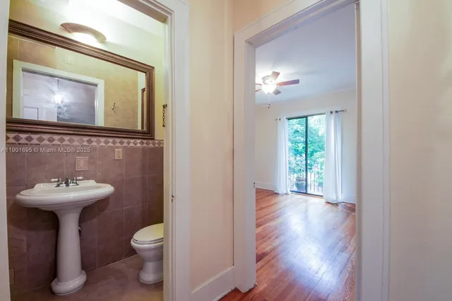a view of an house with swimming pool and furniture