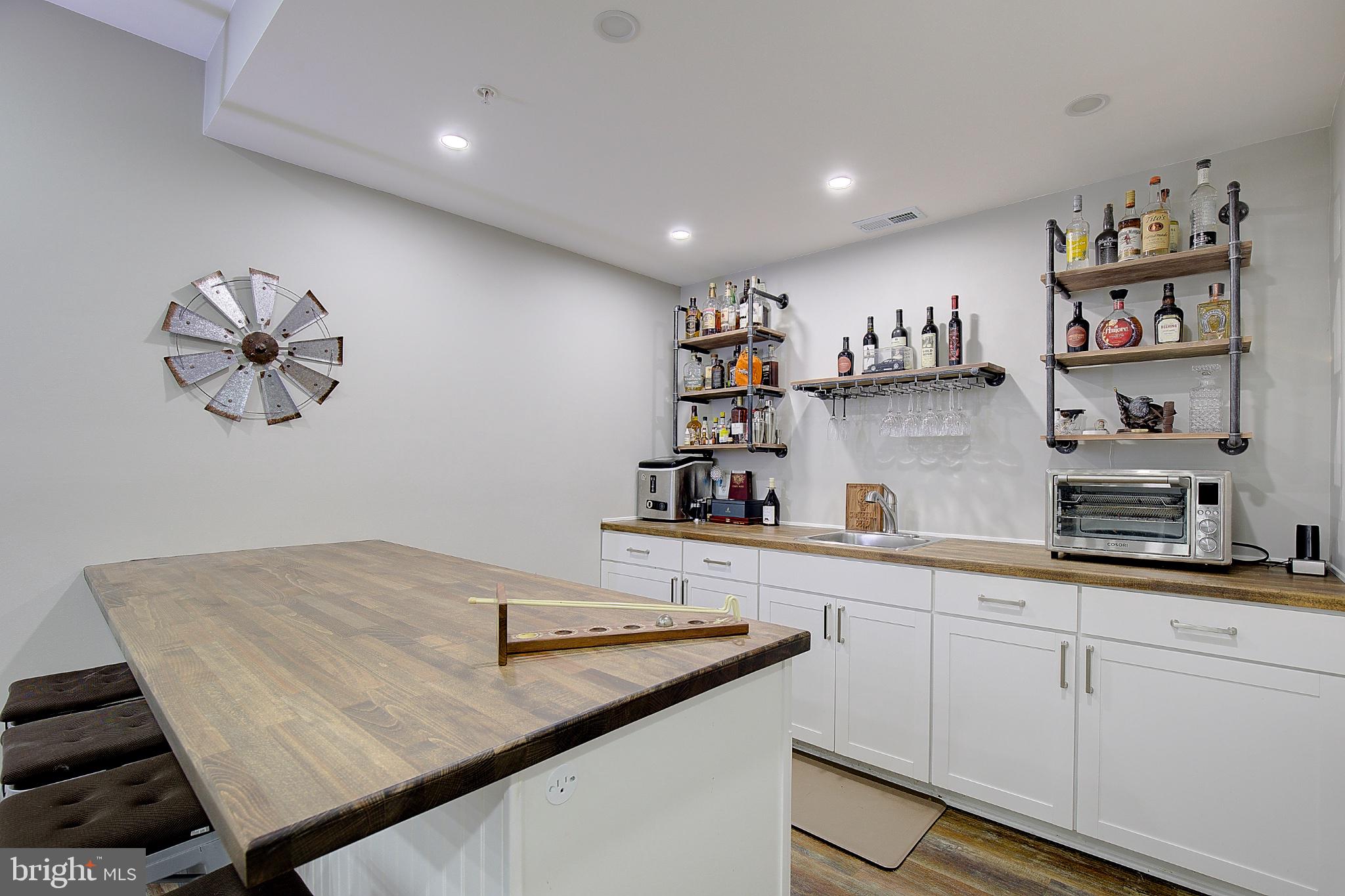 3081 Soper Road Huntingtown, MD 20639 - Photo 45 of 49 Stylish home bar with modern flair.