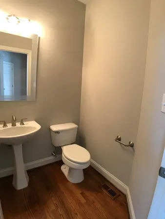 a bathroom with a sink and a toilet