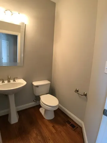 a bathroom with a sink and a toilet