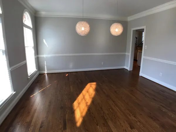 a view of a livingroom with wooden floor